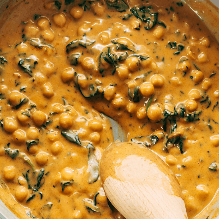 Chickpea curry in a skillet.